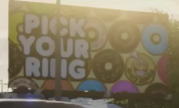 Logo Rusty Brown's Ring Donuts